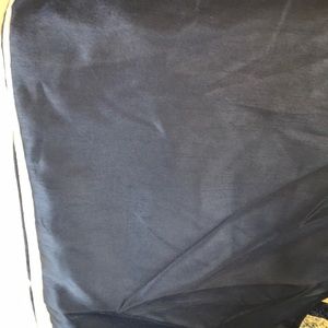 King sized.  Navy blue bed skirt.